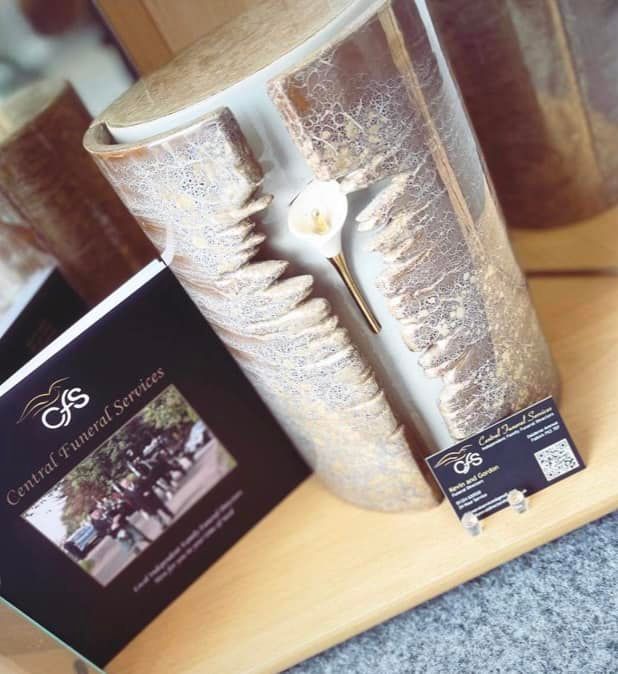 Central Funeral Services brochure and candle