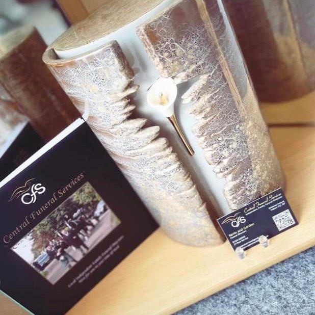 Central Funeral Services brochure and candle